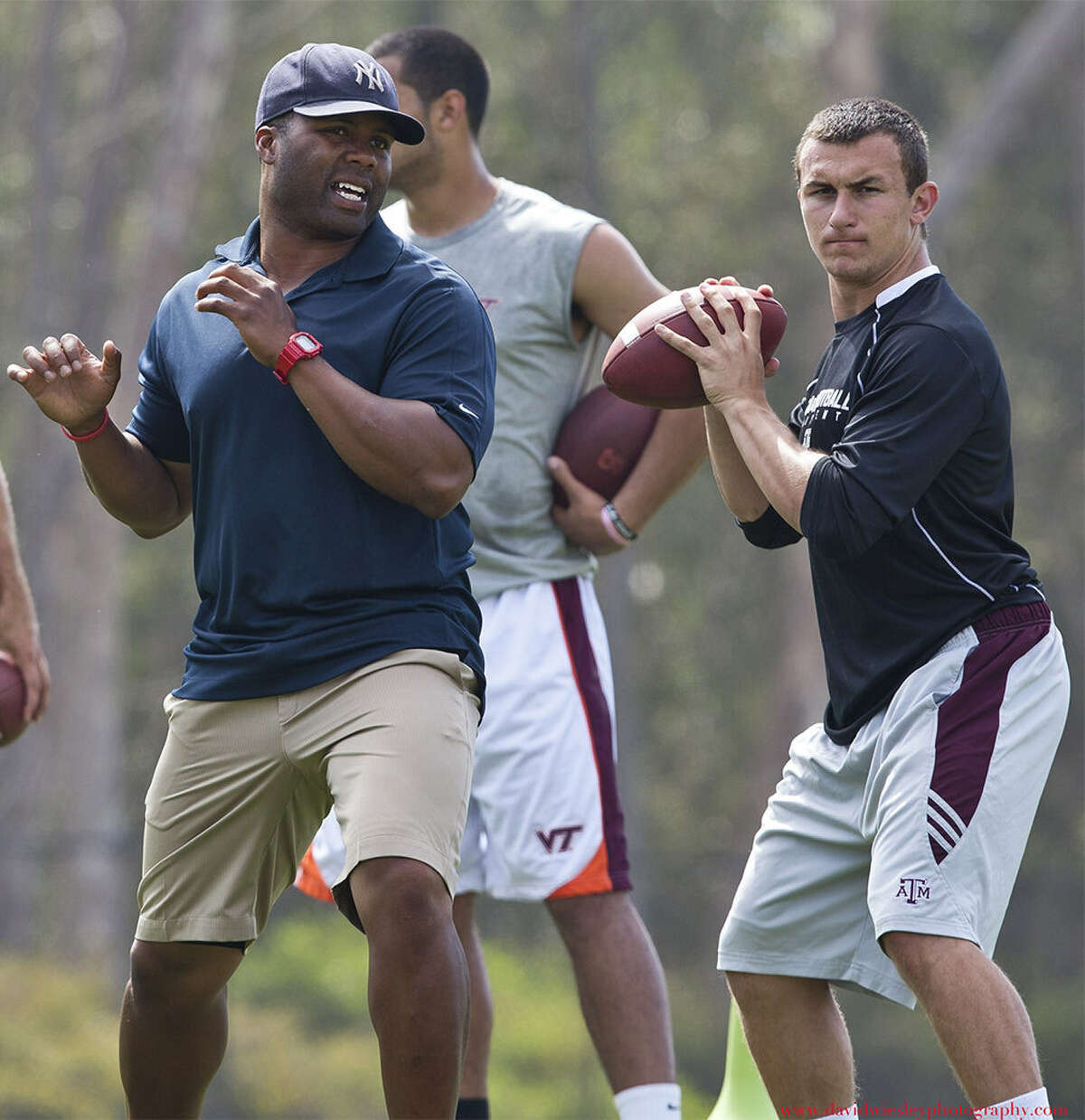 George Whitfield Jr. (left), who has worked with some of the top QBs around, trained Texas A&M's Johnny Manziel last summer.