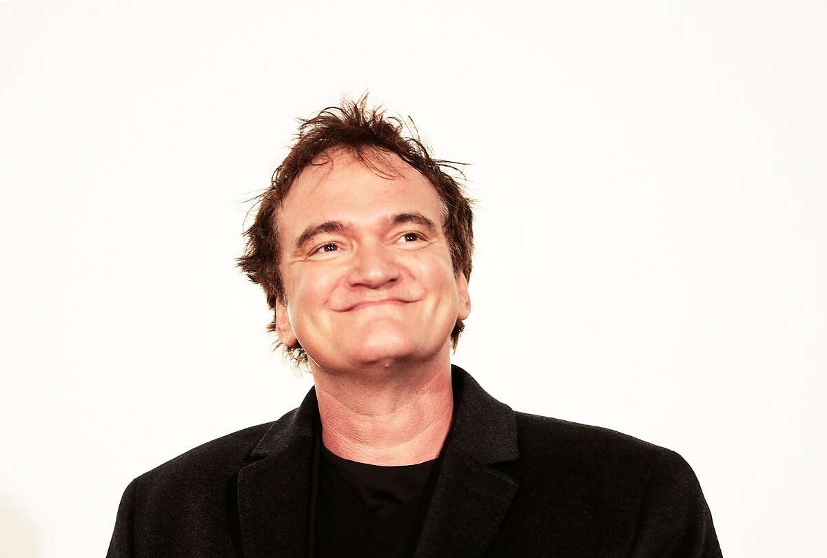 TOKYO, JAPAN - FEBRUARY 13: Director Quentin Tarantino poses for photos before the special screening of 'Django Unchained' at Shinjuku Piccadilly on February 13, 2013 in Tokyo, Japan. The film will open on March 1 in Japan. (Photo by Adam Pretty/Getty Images)