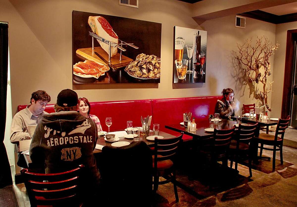 Diners enjoy dinner at Hog Rocks restaurant in San Francisco, Calif., on Sunday, January 12, 2011.