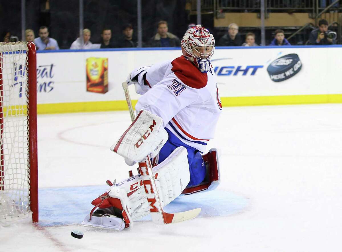 Canadiens goalie Carey Price turns aside a shot for one of his 24 saves against the Rangers.