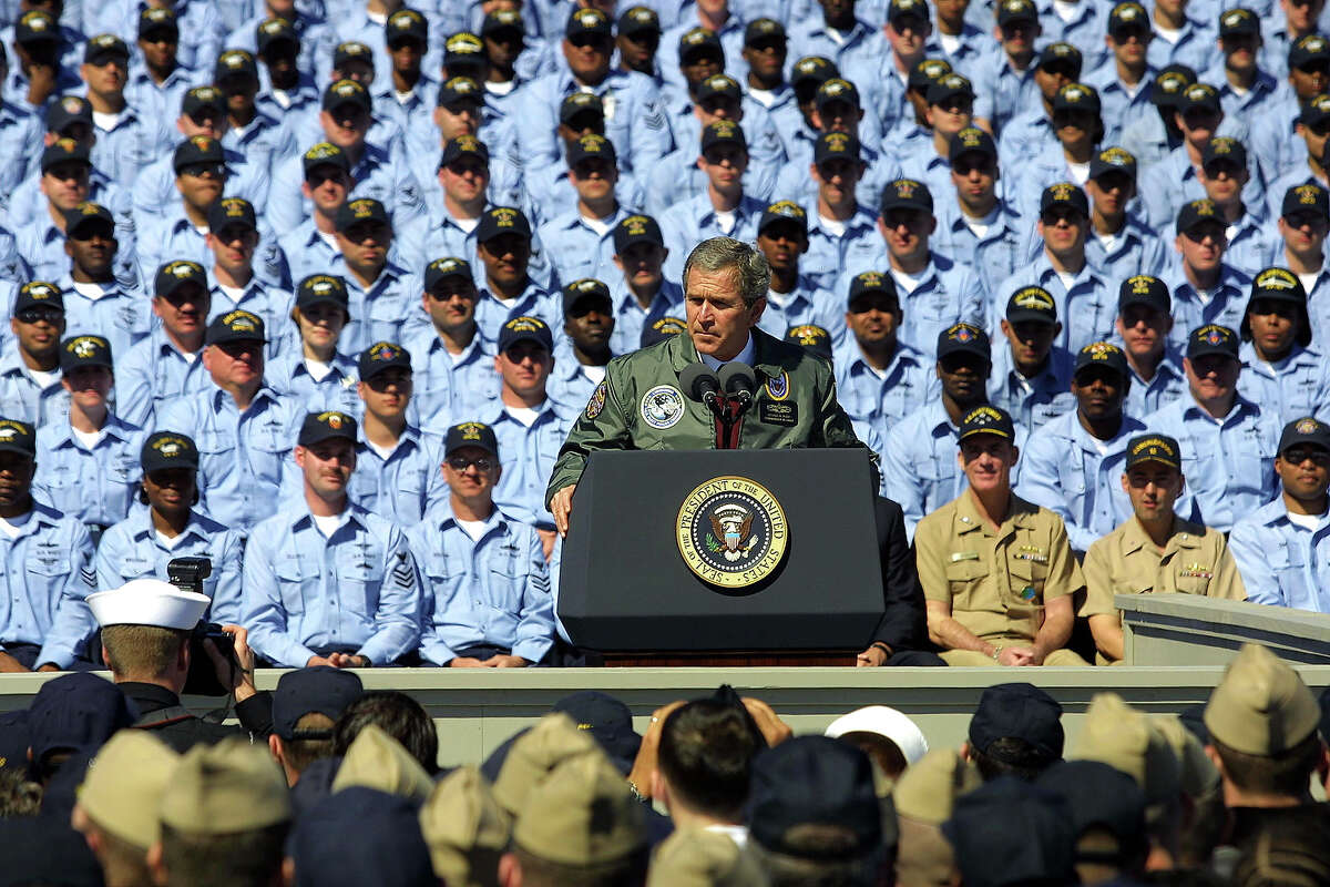 President George W. Bush speaks to approximately 8,000 U.S. sailors at the Naval Station Mayport February 13, 2003 in Jacksonville, Florida. President Bush stated that the U.S. is prepared to win a war with Iraq, should it occur, while urging the United Nations Security Council to enforce demands that Iraqi President Saddam Hussein disarm.
