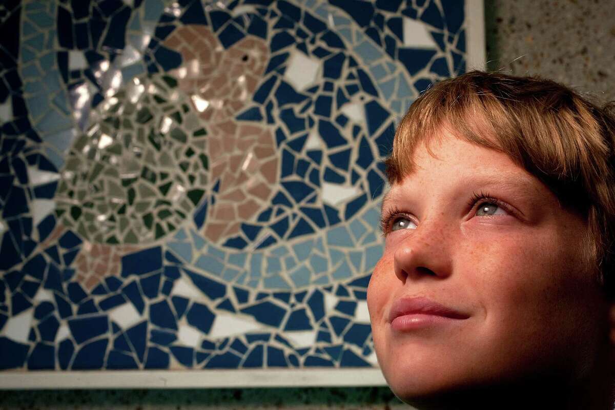 Axel Denner, 10, is a fourth grader on the Oppe Elementary School's Green Team, which is a group of 20 students who helped write a bill to make the Kemp's ridley sea turtle the state sea turtle Wednesday, Feb. 20, 2013, in Galveston.