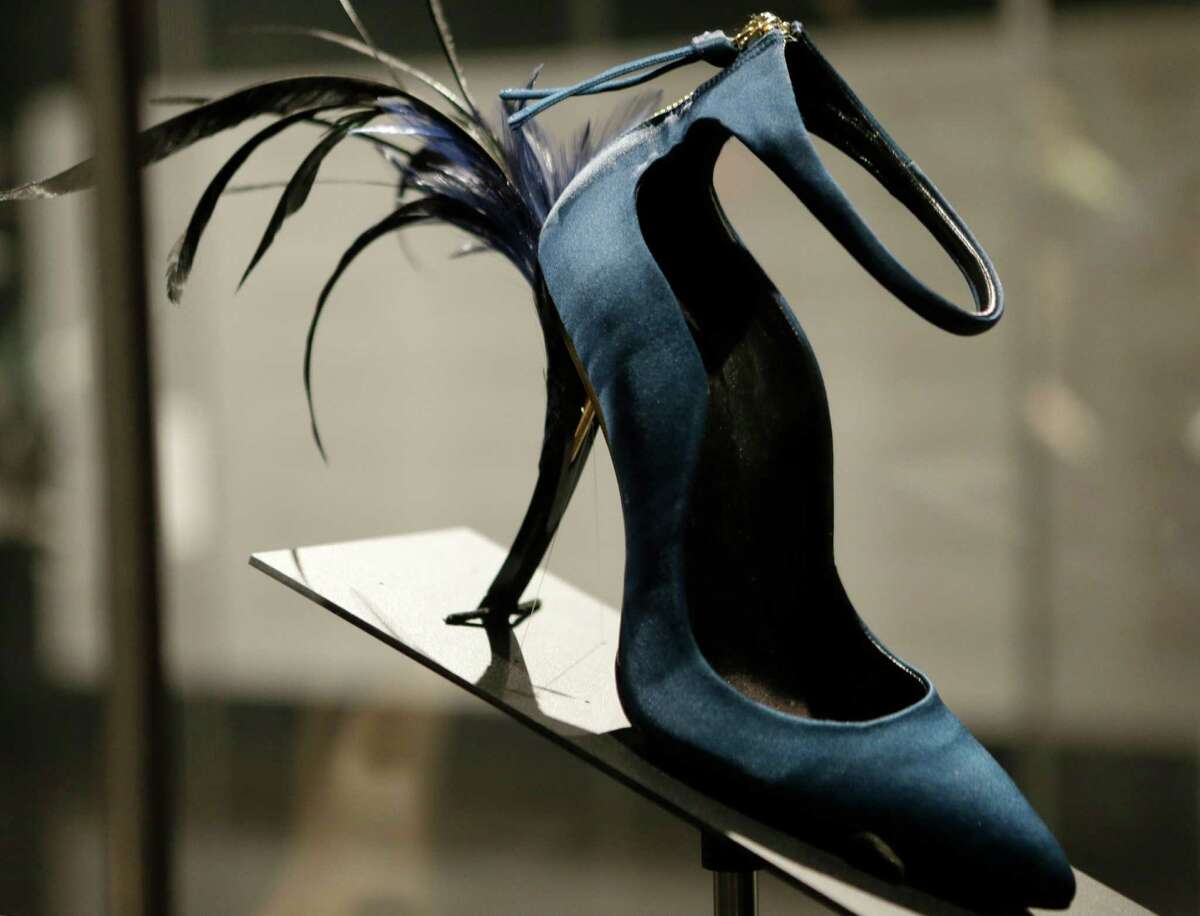 This Feb. 11, 2013 photo shows Roger Vivier's Eyelash Heel pump displayed at the "Shoe Obsession" exhibit at The Museum at the Fashion Institute of Technology Museum in New York. The exhibition, showing off 153 specimens, runs through April 13.