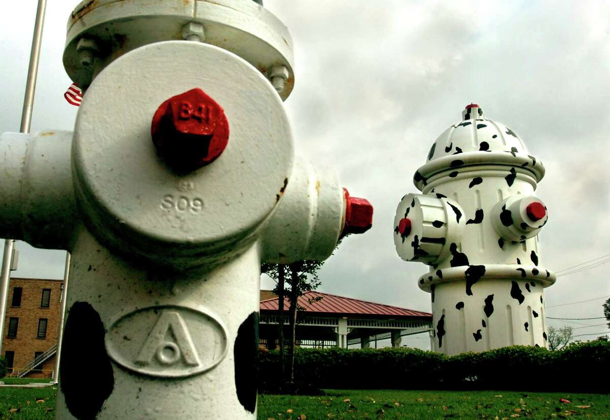 The 24 foot fire hydrant in front of the Fire Museum is a popular photo stop for tourists visiting the Beaumont area. The world's largest Dalmation spotted fire hydrant will be the scene of a dedication ceremony for a sculpture in honor of fallen firefighters by Ron Pettit on Saturday. Tammy McKinley/The Enterprise
