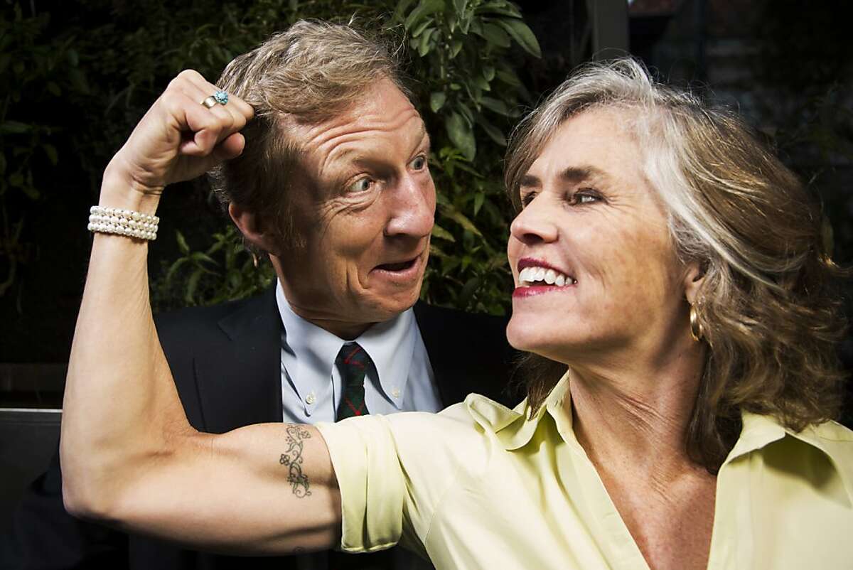 Philanthropists Tom and Kat Steyer stand for a portrait in front of a hydroponics garden in the backyard of their home in San Francisco, Calif. on Thursday, Jan. 31, 2013.