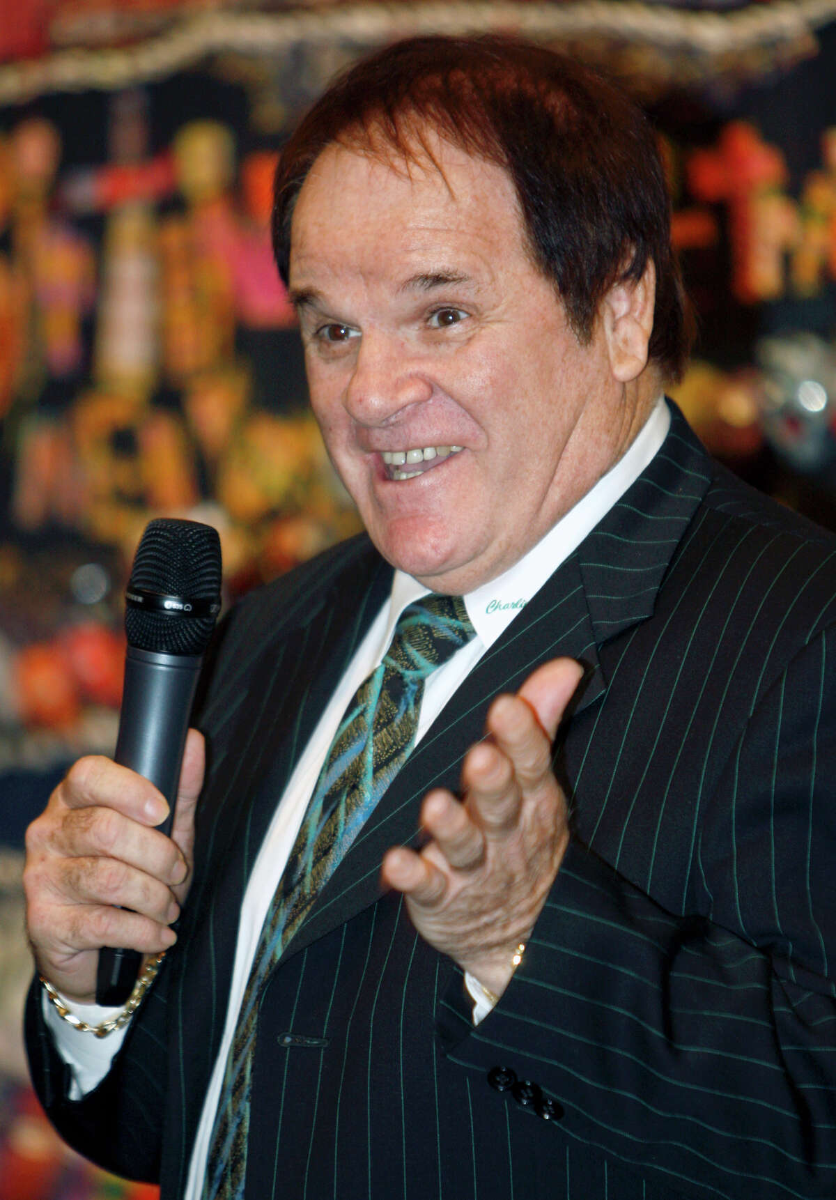 FILE - This May 14, 2011 file photo shows former Major League Baseball great Pete Rose speaking at the Ohio Justice & Policy Center's inaugural gala at the National Underground Railroad Freedom Center, in Cincinnati. Rose is taking a swing at his own reality TV show. Cable's TLC network says it has started production on an unscripted series to chronicle the lives of baseball's all-time hitting leader and his fiancee, model Kiana Kim. (AP Photo/David Kohl, File)