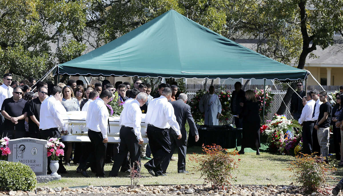 Pallbearers carry Gabriella Lerma's casket at Resurrection Cemetery. The 17-year-old Brandeis High School junior was one of two teens fatally injured in a Northwest Side crash on Tuesday.