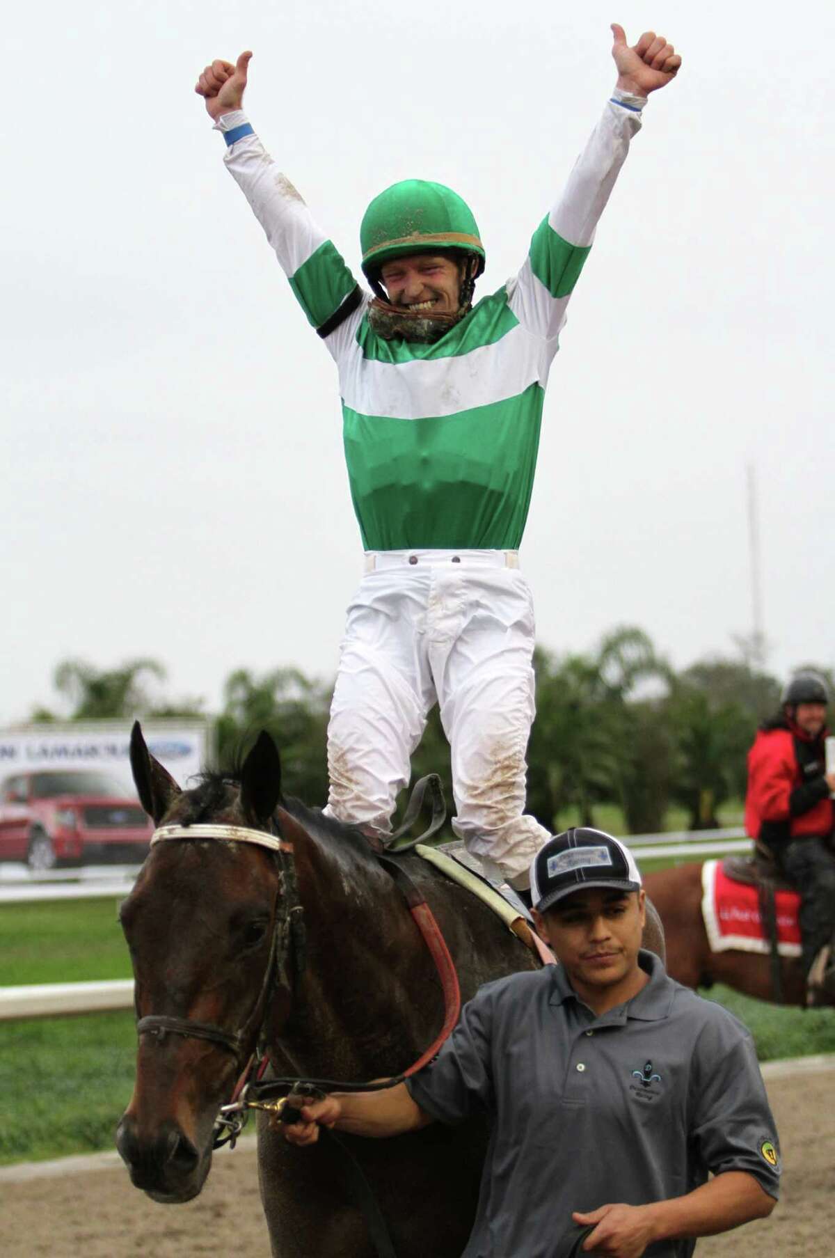 In this image provided by Hodges Photography, jockey James Graham celebrates aboard Ive Struck A Nerve after winning the 40th running of the Grade II Risen Star Stakes horse race at Fair Grounds Race Course Saturday, Feb. 23, 2013, in New Orleans (AP Photo/Hodges Photography, Jamie Hernandez)