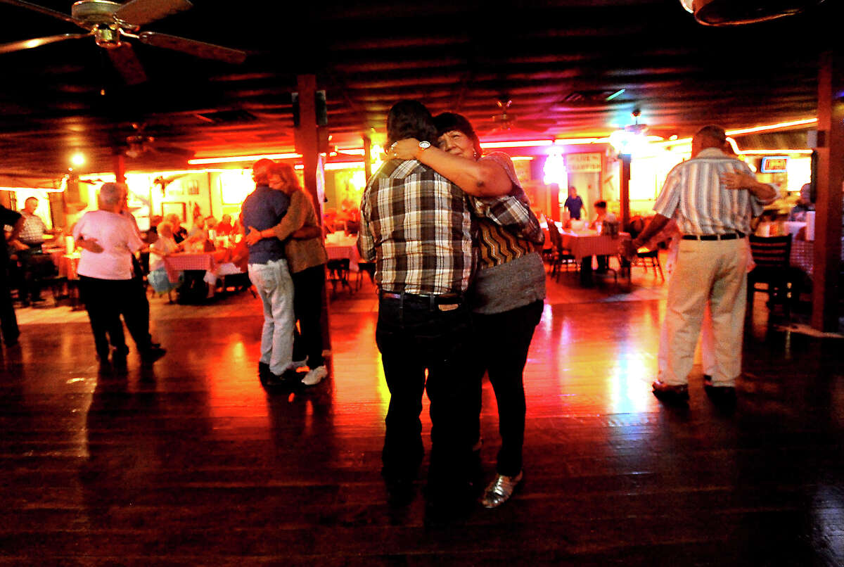 Patron's slow dance at Larry's French Market and Cajun Cafeteria in Groves, Thursday, October 13, 2011. Tammy McKinley/The Enterprise