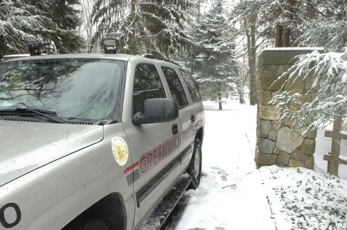 Greenwich, Dec. 31, 2009. A Greenwich police van parked in front of 100 Sterling Road where a murder has taken place. Adam Dobrzanski is charged in killing his daughter Amanda, and attempted to commit suicide.