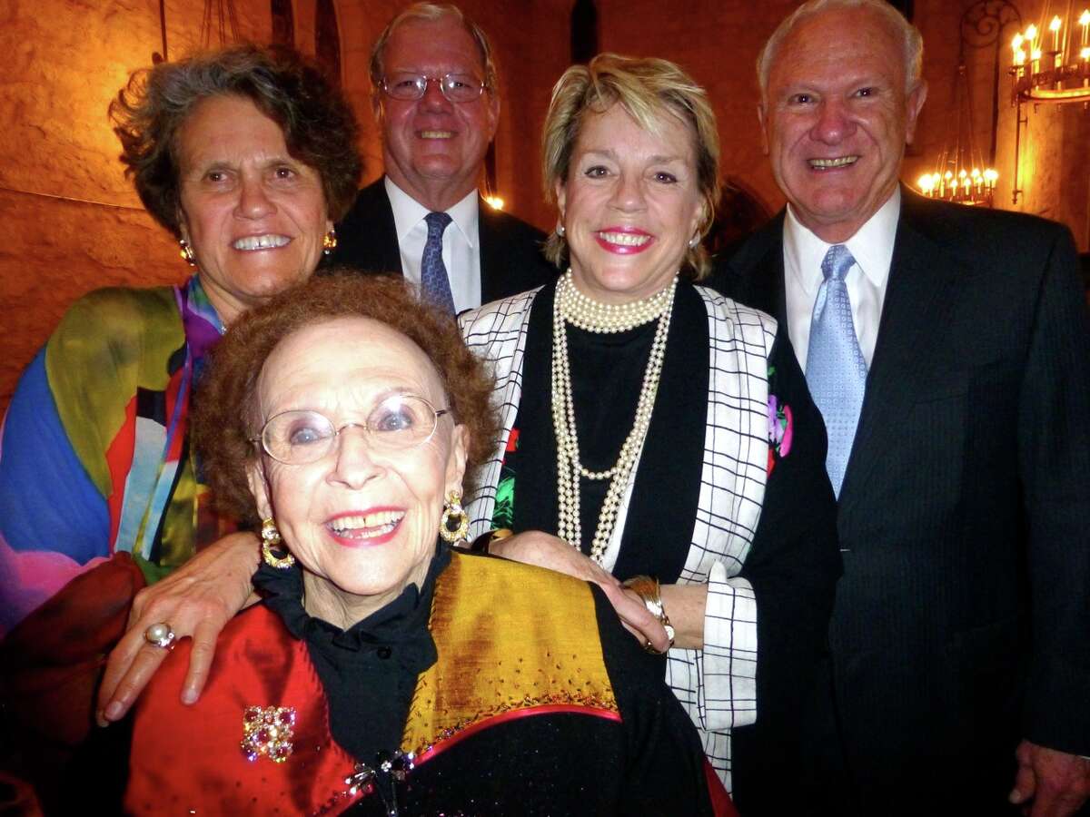 Edith McAllister (front), is flanked by her children Eloise (from left), Reagin, Taddy and Bo at her 95th birthday celebration at the Southwest School of Art, which she helped found.