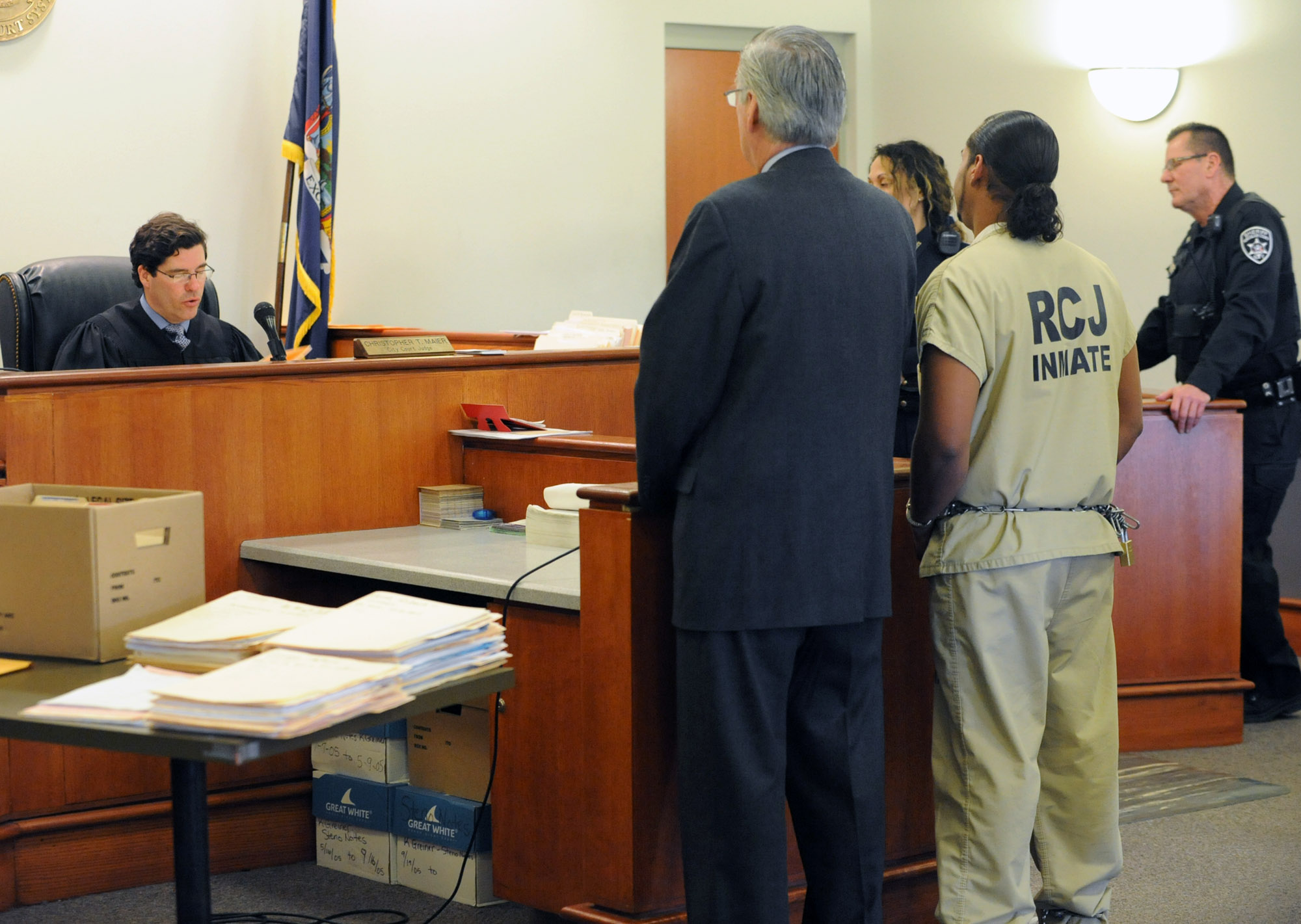 Man accused of stealing from cars is arraigned