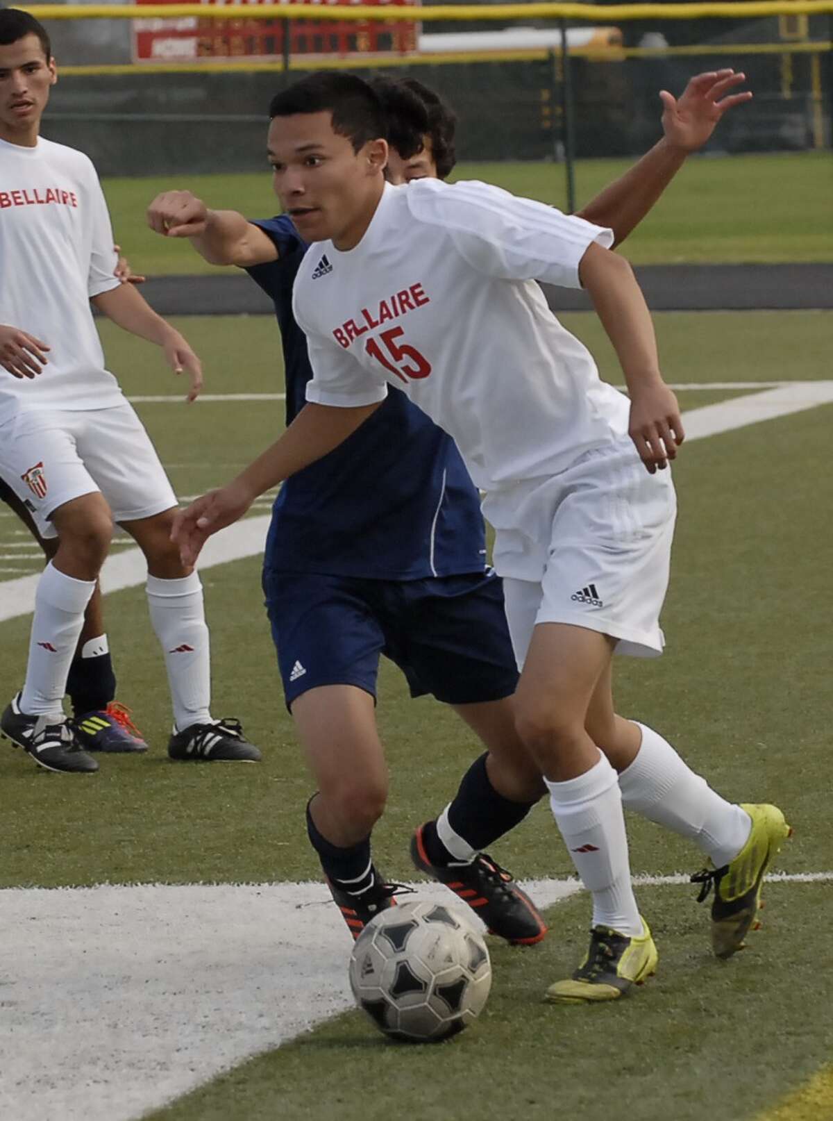 Samuel Calderon (#15) with Bellaire controls the ball during their game with Lamar at Butler Stadium Friday 2/22/13. Photo by Tony Bullard.