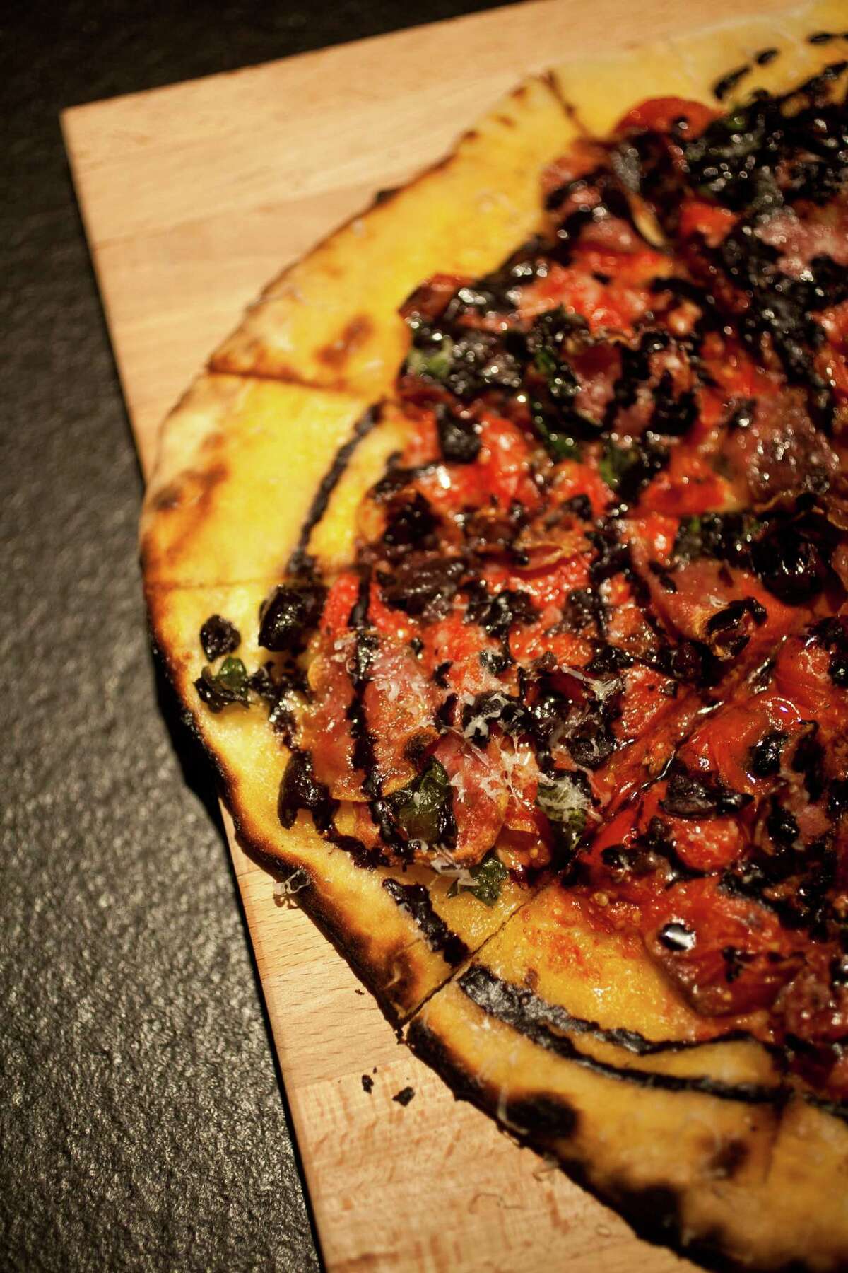 Rising crust Pizza places popping up in Houston