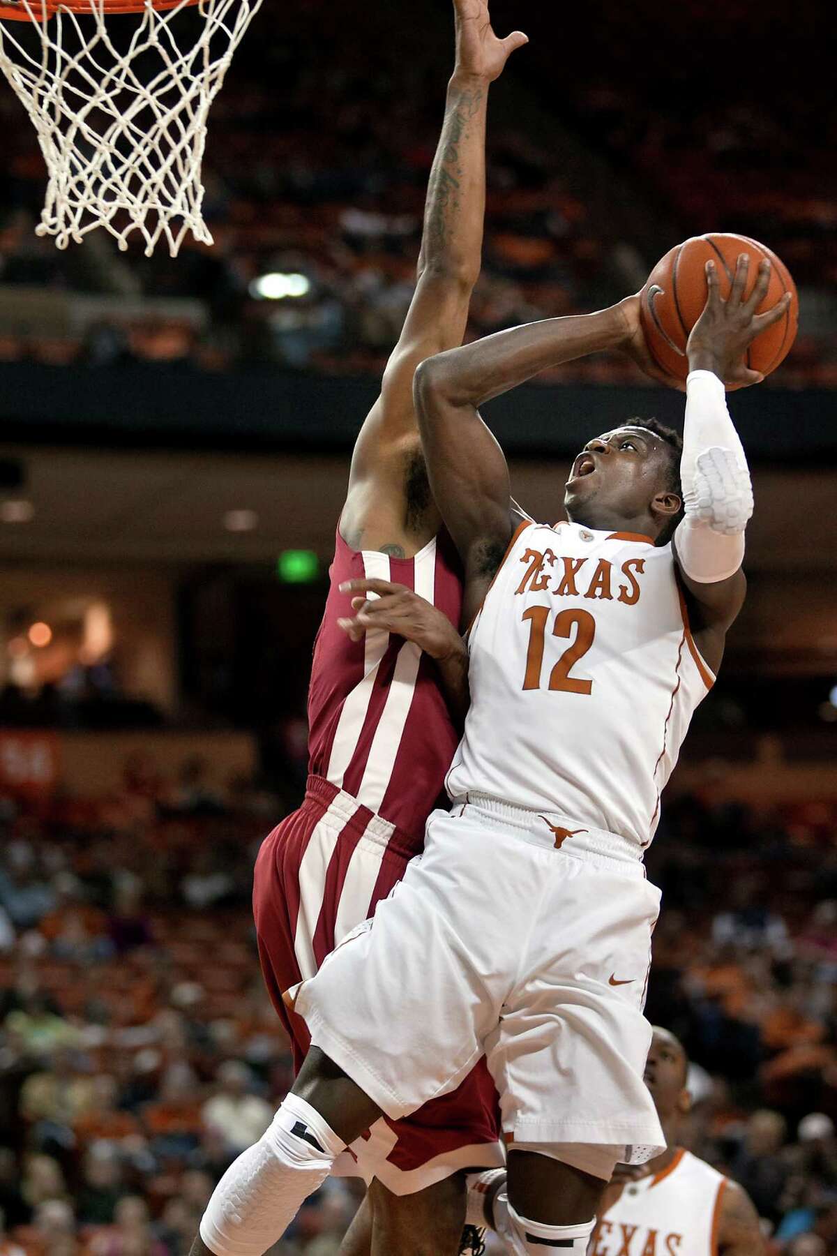 Texas' Myck Kabongo (12) went for 31 points Wednesday, including the jumper that sent the game into overtime.