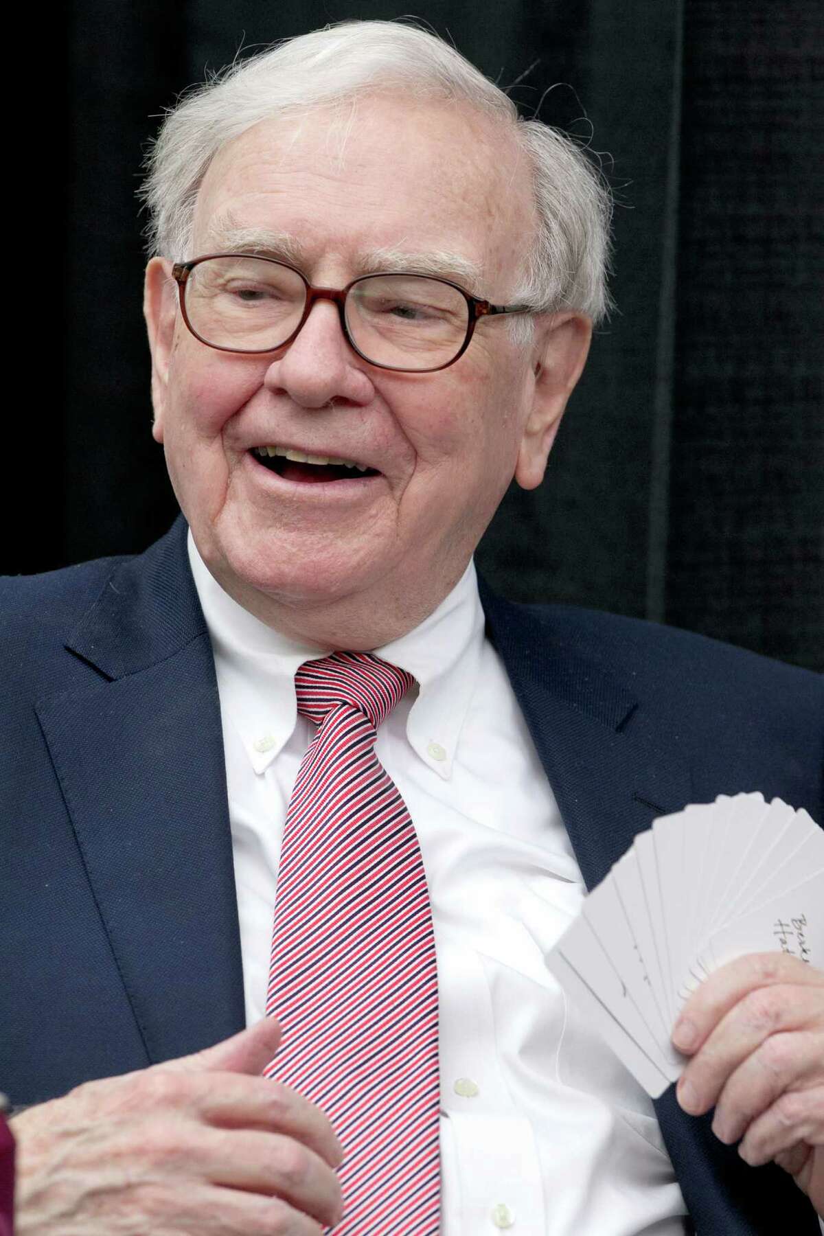 FILE- In this May 6, 2012, file photo,Warren Buffett, chairman and CEO of Berkshire Hathaway, plays bridge during the annual shareholders meeting in Omaha, Neb. Warren Buffett will release his annual letter to the shareholders on Friday, March 1, 2013. (AP Photo/Nati Harnik)