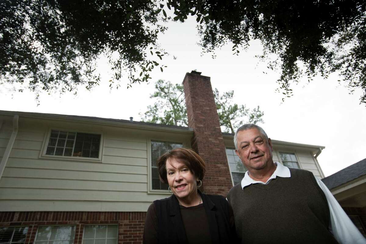 Deborah and Roland Tejada who run Tejas Roofing and Contracting, a small home-based business that stands to be affected by a bill in the Texas legislature proposing to put new restrictions on roofers., Feb. 28, 2013 in Houston.