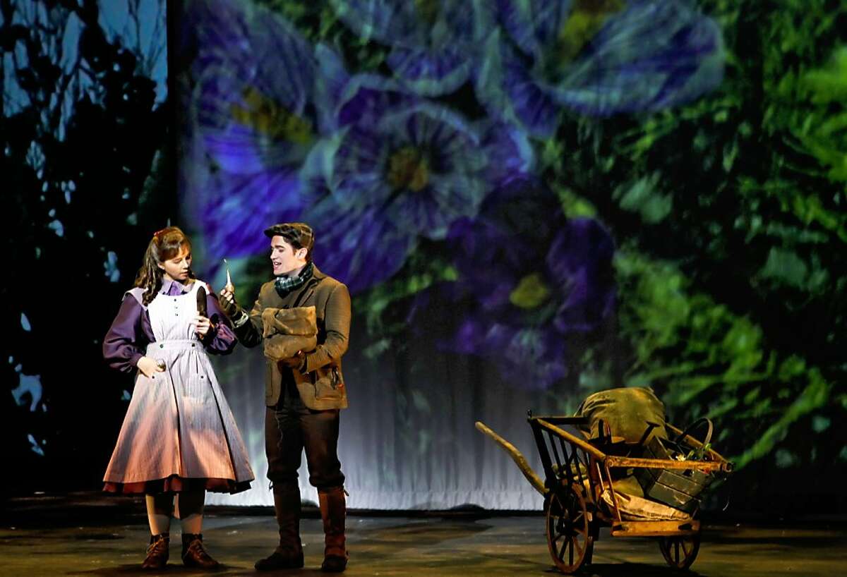 Mary Lennox, played by Sarah Shafer and Dickon Sowerby, played by Scott Joiner spend some time in the Secret Garden during the final dress rehearsal at the UC Berkeley Zellerbach Hall on Wednesday Feb. 27, 2013, in Berkeley, Ca. Cal performances along with San Francisco Opera combine to give the world premier of the new opera, "The Secret Garden, the Victorian-era children's classic about a lonely girl who finds a secret garden.