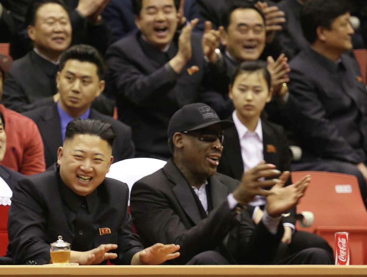 North Korea's Kim Jong Un and former NBA star Dennis Rodman watch an exhibition basketball game in Pyongyang.