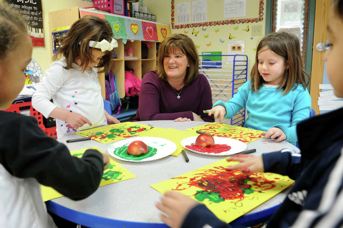 Owner Kimberly Kick works with Pre-K students at the Goddard School, in Orange, Conn., Feb. 26th, 2013.