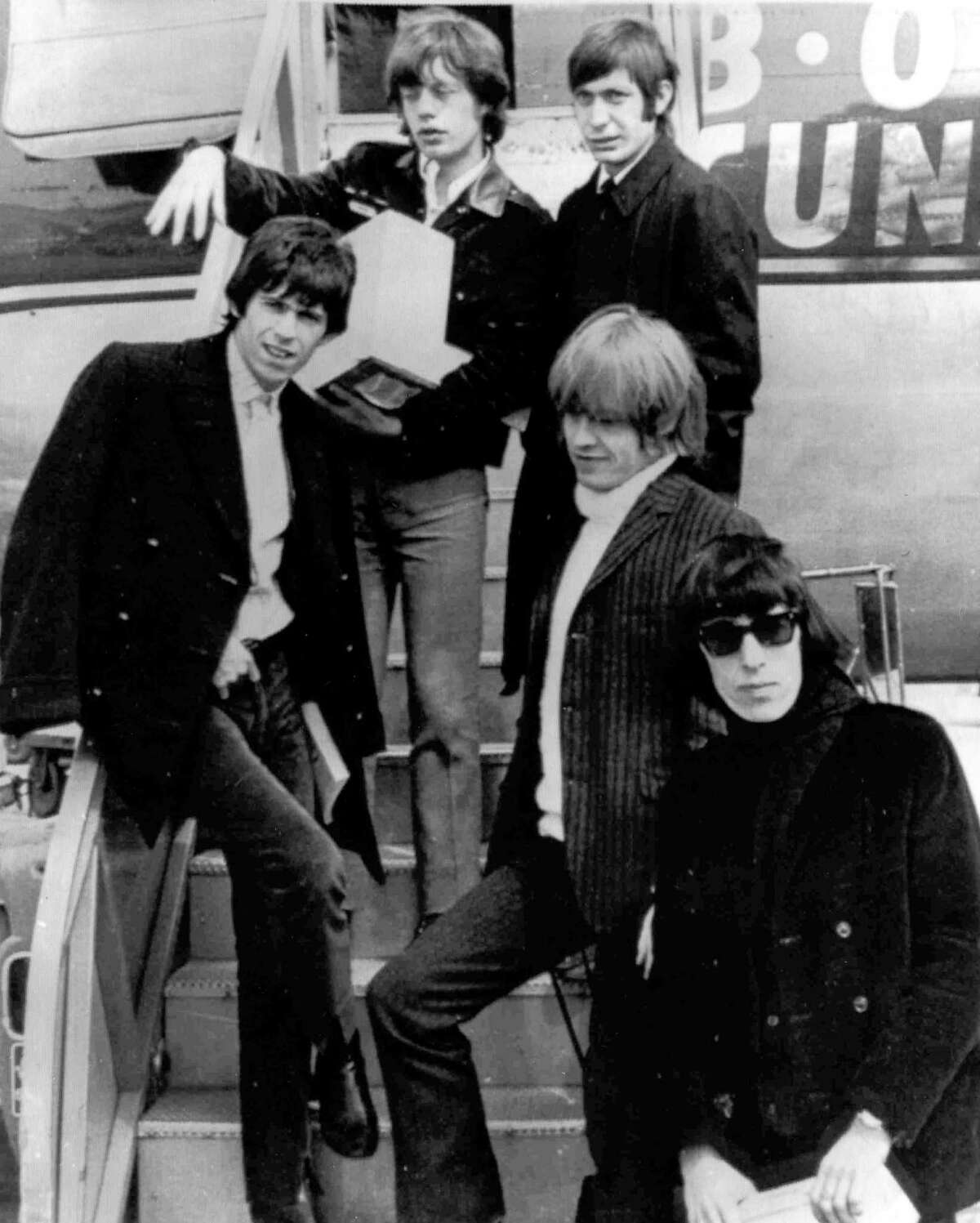 English Rock And Roll Group The Rolling Stones, From Left, Guitarist