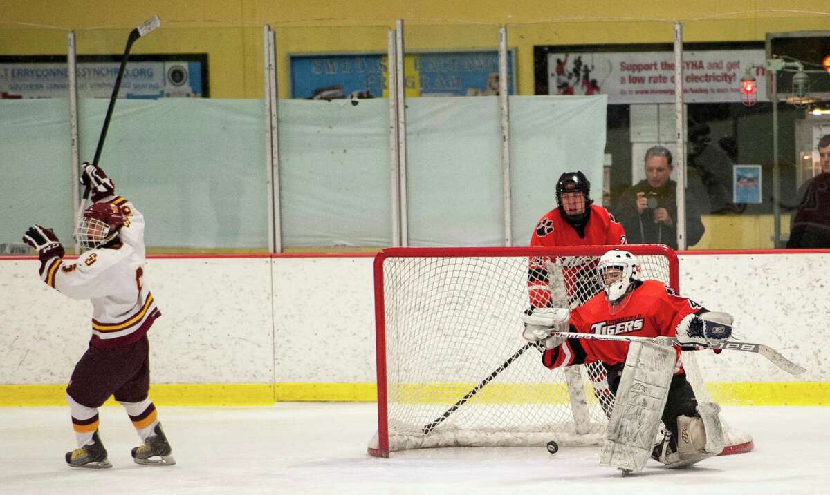 Ridgefield repeats as FCIAC boys hockey champions