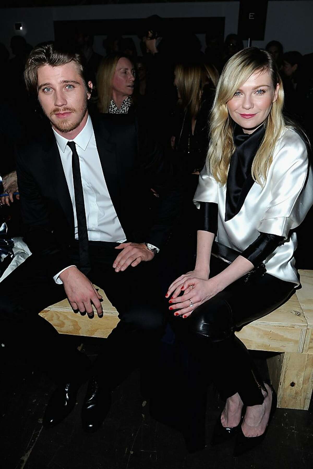 PARIS, FRANCE - MARCH 04: Kirsten Dunst and Garrett Hedlund attend the Saint Laurent Fall/Winter 2013 Ready-to-Wear show as part of Paris Fashion Week on March 4, 2013 in Paris, France. (Photo by Pascal Le Segretain/Getty Images)