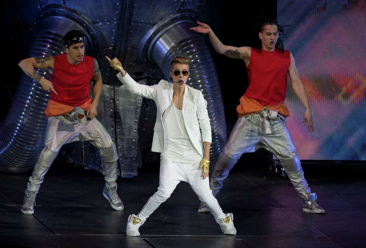 Canadian singer Justin Bieber performs at the o2 Arena in east London, Monday, March 4, 2013. (Photo by Joel Ryan/Invision/AP)