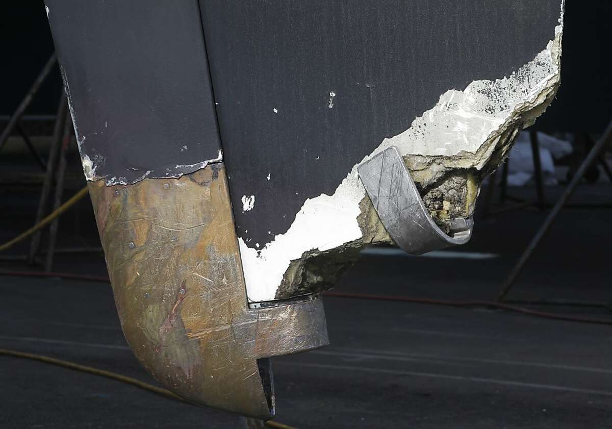 The heavily-damaged rudder of the sailboat Darling is seen at the Bay Marine Boatworks boatyard in Richmond, Calif. on Tuesday, March 5, 2013. Three people remain in custody after they reportedly stole the 82' vessel from a marina in Sausalito and ran the boat aground in Pacifica early Monday morning.