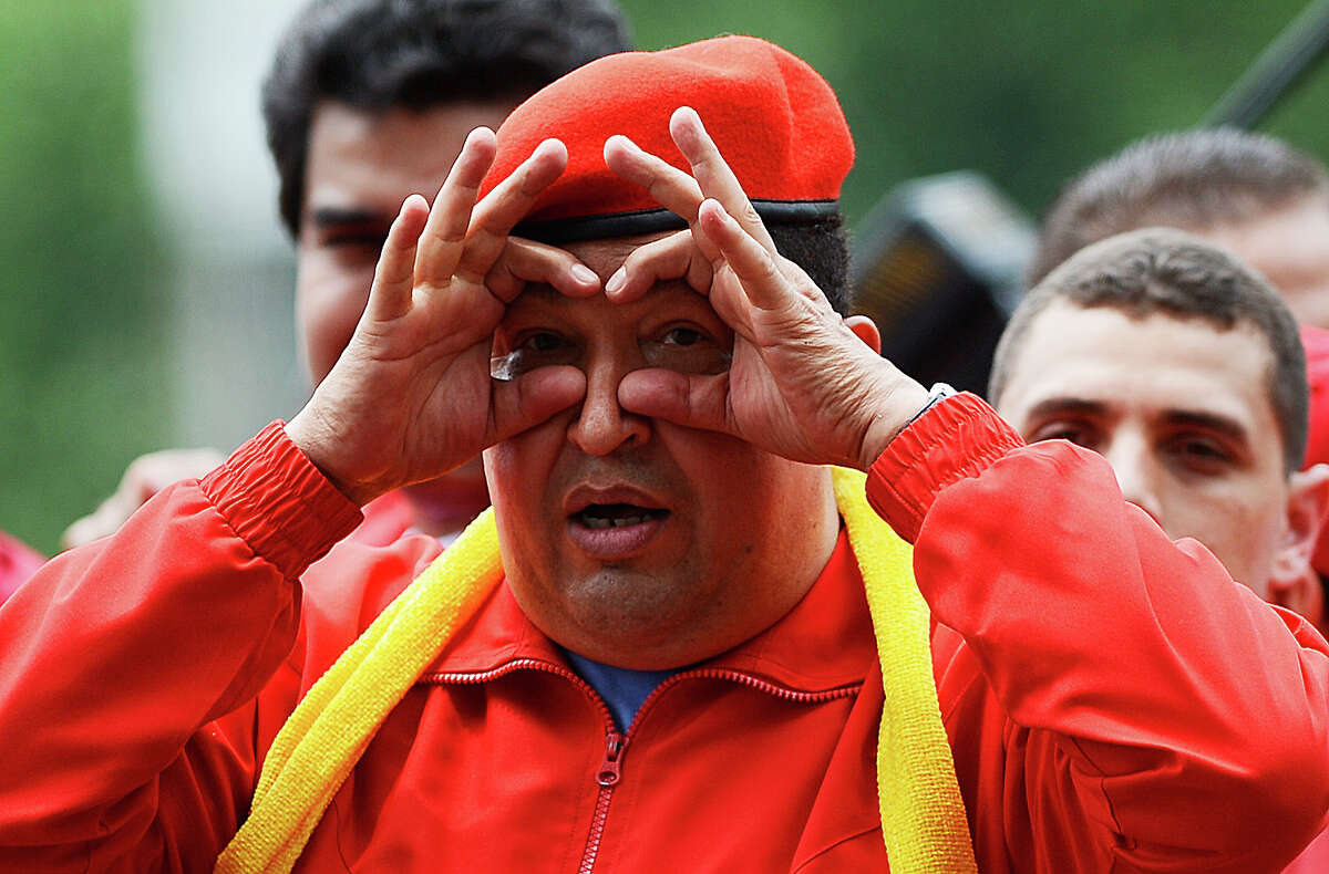 Venezuelan President Hugo Chavez gestures during the opening rally of his campaign for re-election in Mariara, 120 km west of Caracas on July 1, 2012.