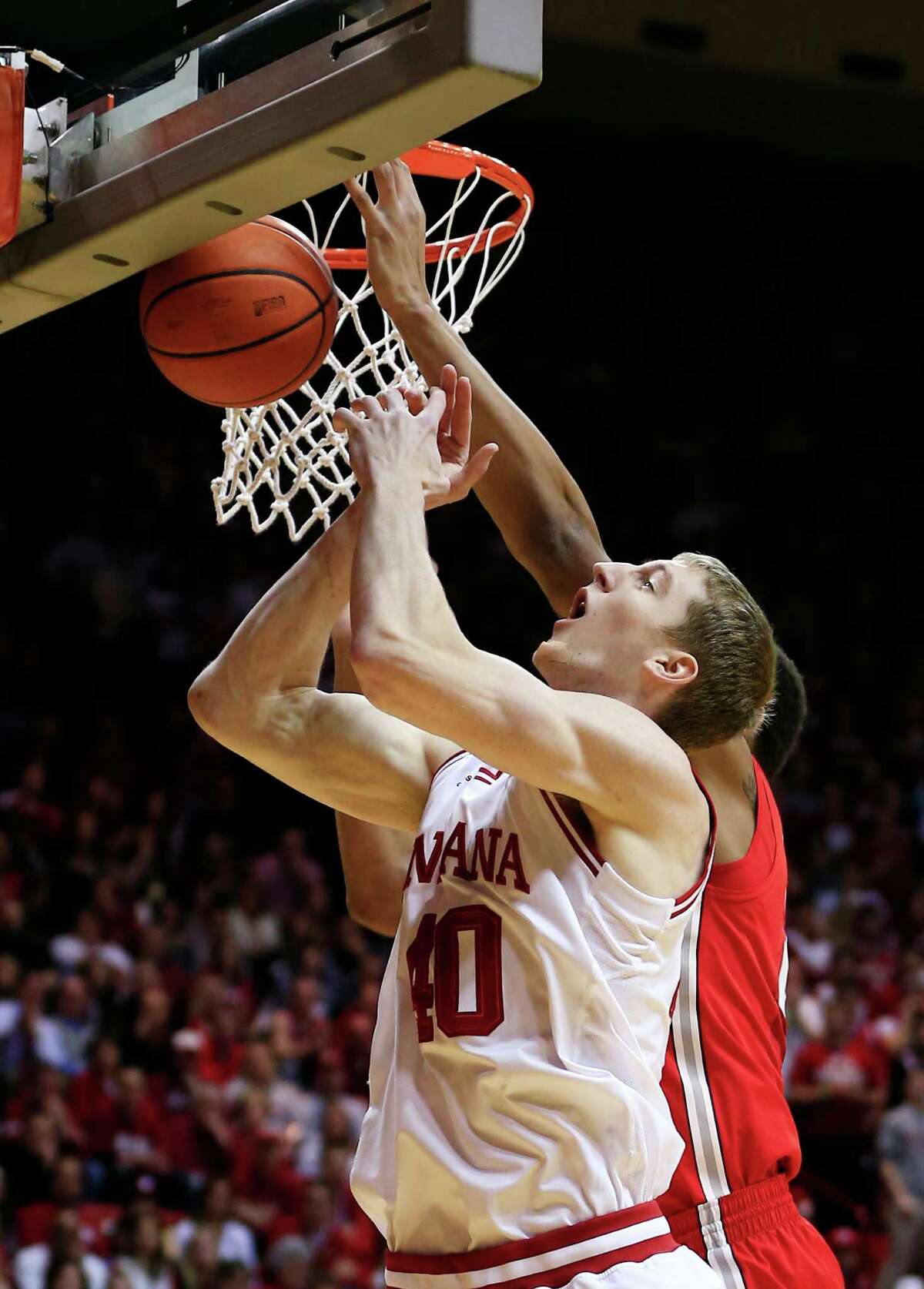 Indiana's Cody Zeller (40) goes up to grab a rebound during the first half of an NCAA college basketball game against Ohio State, Tuesday, March 5, 2013, in Bloomington, Ind. (AP Photo/Darron Cummings)