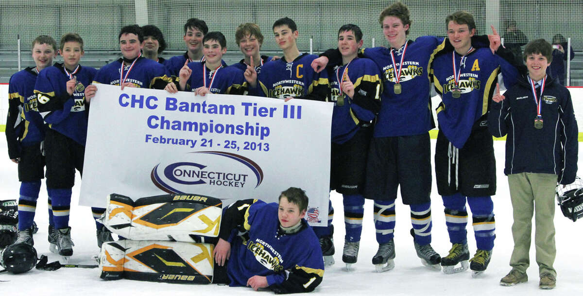 The Northwestern Hockey Bantams recently captured the state Tier III youth ice hockey championship during competition Feb. 21-25, 2013. Contributing to the title were and goaltender Connor Lautier of New Preston and, from left to right, Justin Thompson of New Milford, Griffon McIntyre of Litchfield, Avery Hook of New Milford, Isaac Purdy of Bridgewater, David DeMeo of New Preston, Griffin Smith of Woodbury, Jack Sommerfeld of Brookfield, captain Brian Manzer of Southbury, assistant captain Payton Meyer of New Milford, Jack Kennedy of Roxbury, assistant captain Riley Zimmerman of New Milford and Max Ryan of Woodbury. The Northwestern Connecticut Courtesy of Manzer