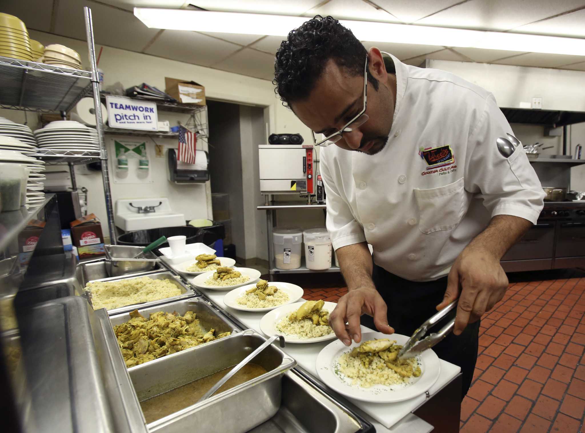 Chefs prepare gourmet fare for AIDS group