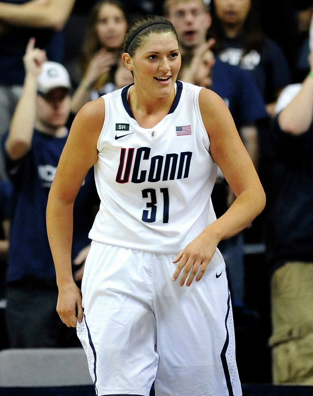 Connecticut's Stefanie Dolson reacts during the first half of an NCAA college basketball game in Storrs, Conn., Sunday, Feb. 10, 2013. Dolson had 22 points in the first half. (AP Photo/Jessica Hill)