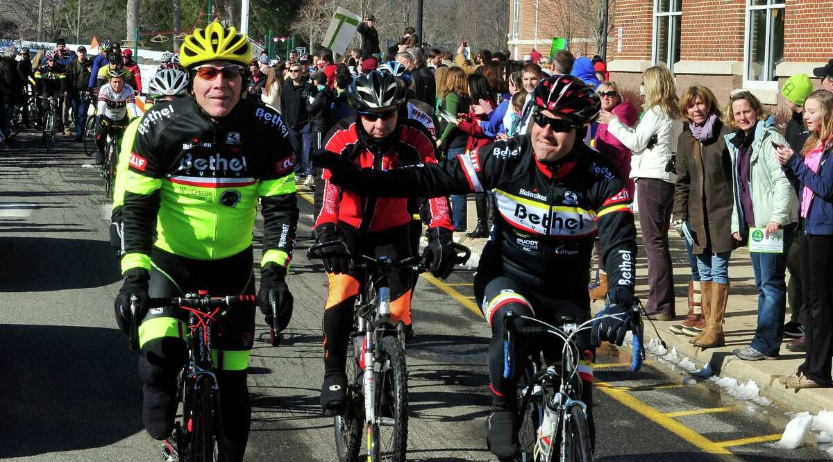Team 26 and supporting riders, including Jay Moody, left, leave Reed Intermediate School in Newtown, Conn. Saturday, March 9, 2013 on the Sandy Hook Ride to Washington, D.C., to support gun control legislation.