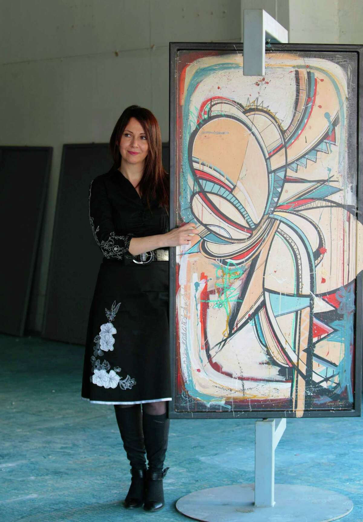 Karine Parker-Lemoyne, executive director of the Texan French Alliance for the Arts, says the swinging, painted steel doors - this one by French artist Romain Froquet - will be placed on display at 13 locations around Houston.