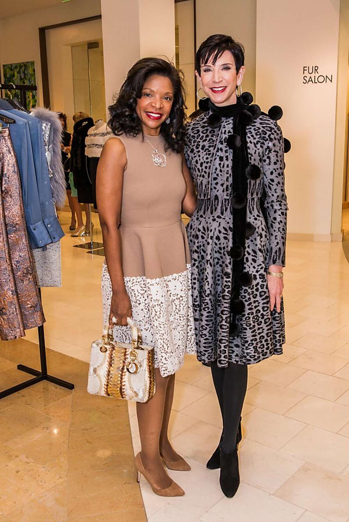 Vanity Fair introduced new rules for its International Best-Dressed List balloting, and contributor Amy Fine Collins (in black and gray Azzedine Alaia dress) came to a lunch at Neiman Marcus March 7, 2013, to let San Francisco's stylish set in on the details. Collins is seen here with arts patron Pamela Joyner in a beige Dolce and Gabbana dress.