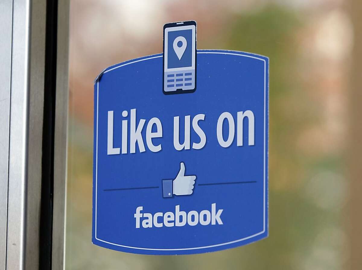 FILE - In this Dec. 13, 2011 file photo, a sign with Facebook's "Like" logo is posted at Facebook headquarters near the office for the company's User Operations Safety Team in Menlo Park, Calif. A study by researchers at Cambridge, published Monday, March 11, 2013 in the Proceedings of National Academy of Sciences, has found that clicking the social network's friendly blue "like" buttons may reveal more about people than they realize. (AP Photo/Paul Sakuma, File)