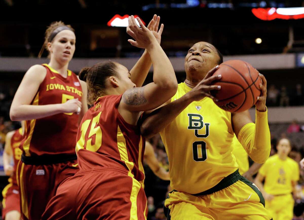 Baylor guard Odyssey Sims (0) drives against Iowa State guard Nicole Blaskowsky (15) as Hallie Christofferson (5) watches in the first half of their NCAA college basketball championship game in the Big 12 Conference tournament, Monday, March 11, 2013, in Dallas. (AP Photo/Tony Gutierrez)