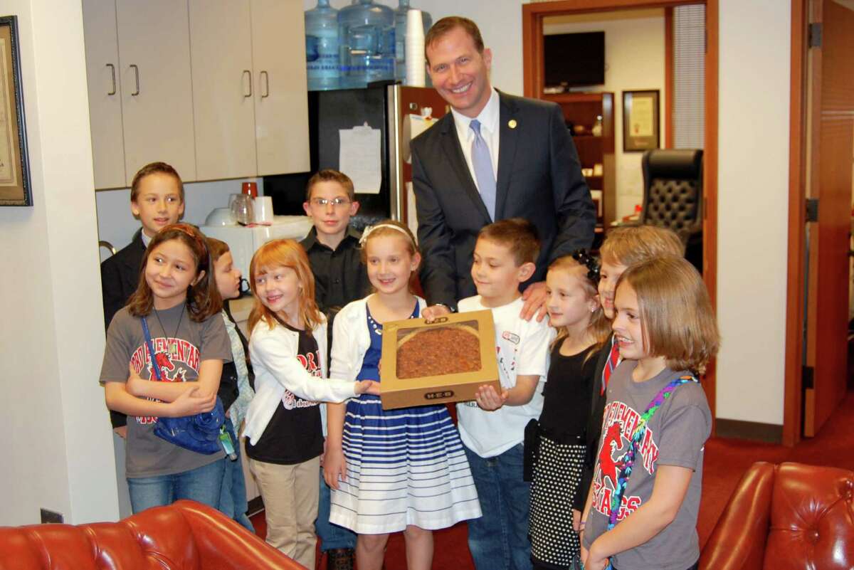 State Sen. Charles Schwertner, R-Georgetown, met with first graders from Georgetown's Ford Elementary School, who asked him to introduce a resolution to make pecan pie the official State Pie of Texas.