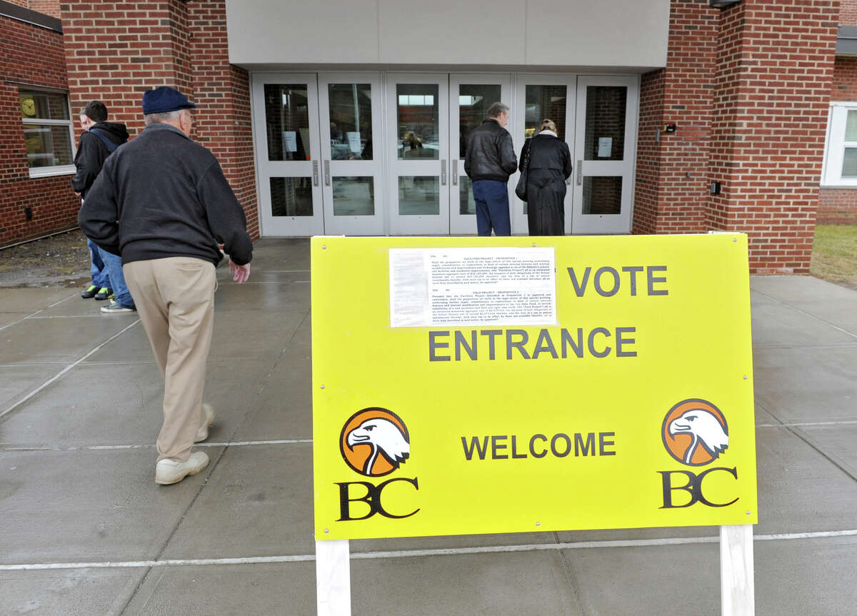 Taxpayers enter Bethlehem High School to vote on nearly $24 million in capital projects under consideration in Bethlehem Central School District on Tuesday March 12, 2013 in Bethlehem, N.Y. (Lori Van Buren / Times Union)