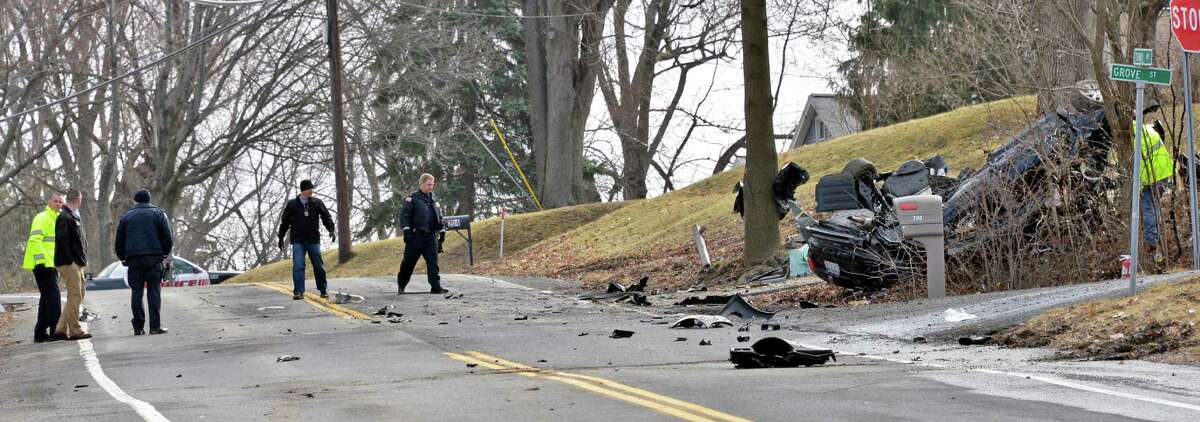 Police investigators from Rensselaer and East Greenbush at the scene of a car crash on Third Avenue and Grove Street in East Greenbush Wednesday March 13, 2013. (John Carl D'Annibale / Times Union archive)