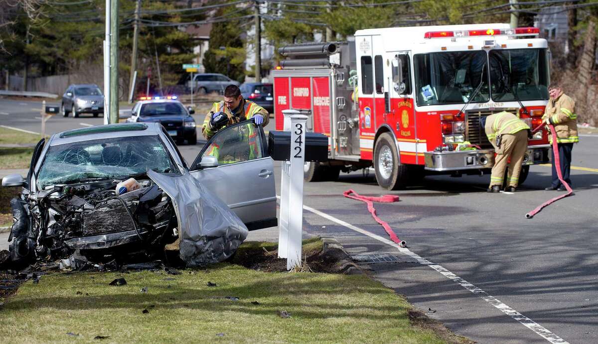 Accident sends car into stone wall