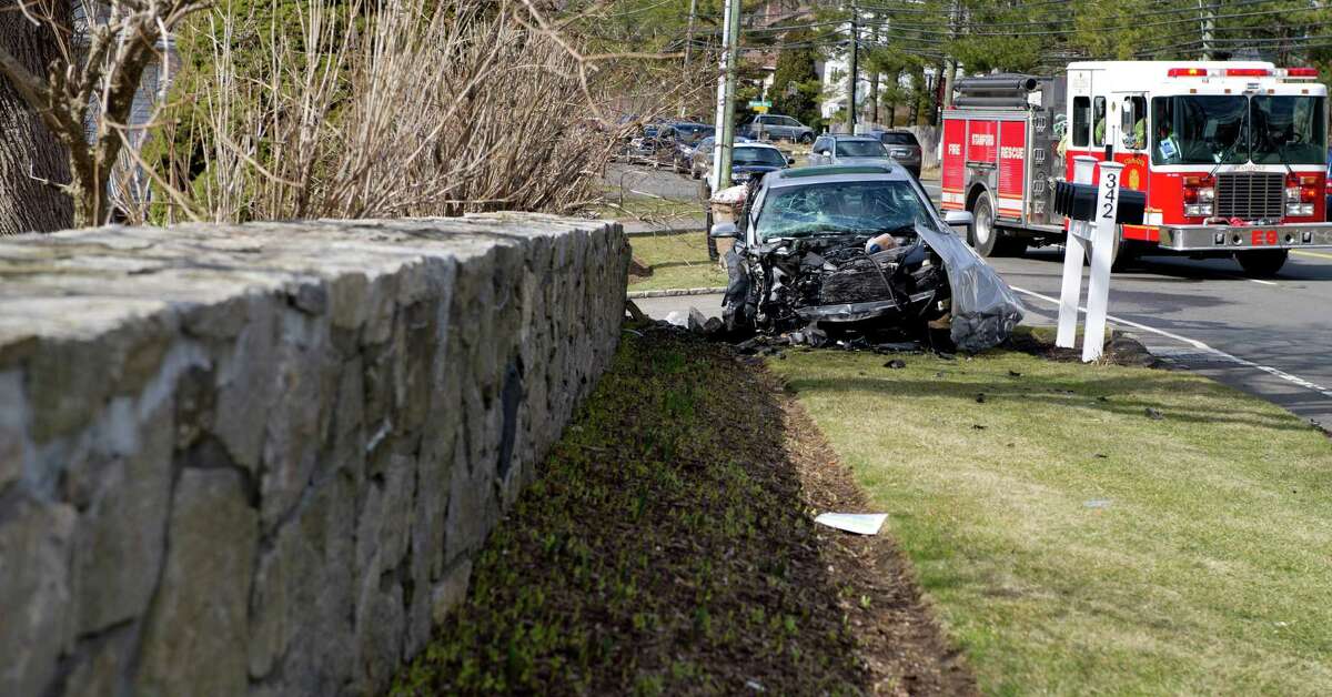 Accident sends car into stone wall