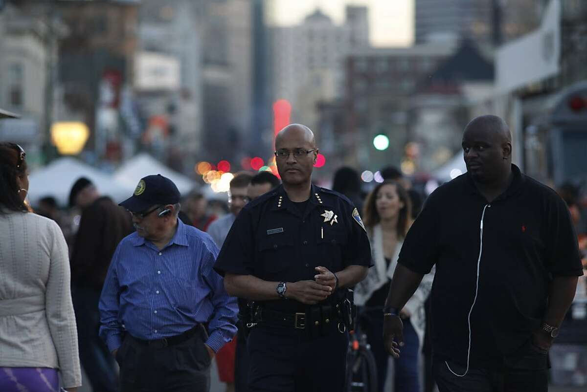 Oakland Chief of Police, Howard Jordan walks through the crowd during the First Friday event, Friday March 1, 2013, in Oakland, Calif. The mood is different said some spectators in the wake of shooting during last month's event leaving one person dead.