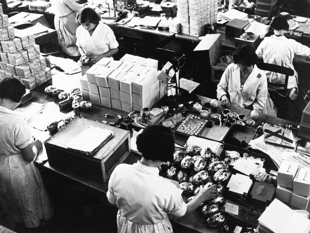 Manufacturing easter eggs at the Cadbury factory at Bourneville in Birmingham, England, pictured in the 1940s.