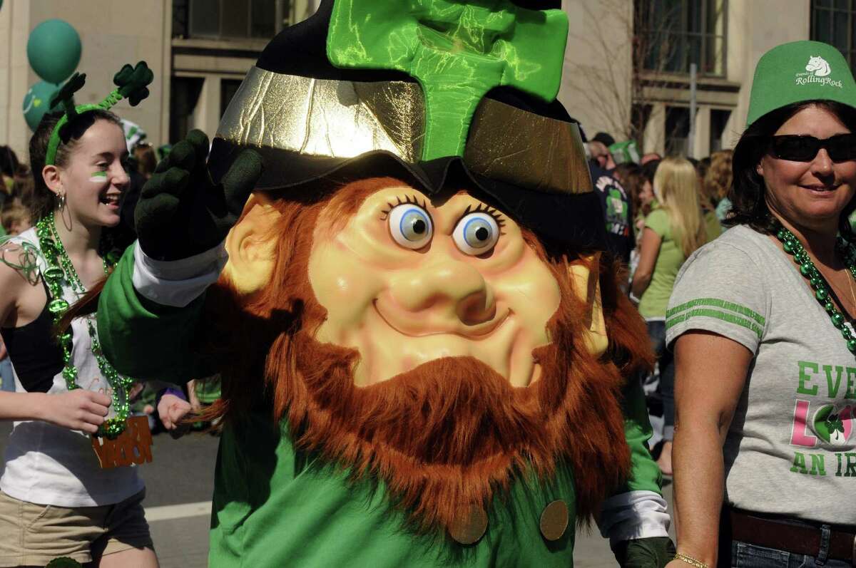 A leprechaun character marches in the 62nd Annual Albany St. Patrick?s Parade in Albany, NY Saturday March 17, 2012.( Michael P. Farrell/Times Union )