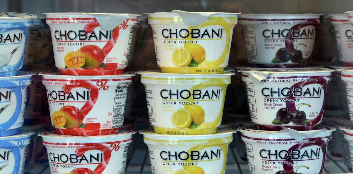 Yogurt containers at the Chobani plant in New Berlin, N.Y., Dec. 29, 2011. Sales of Greek yogurt are booming, a benefit of the perception that the food is healthier than regular yogurt and other snacks, so leading brands are expanding their operations and the production jobs they entail. (Heather Ainsworth/The New York Times)