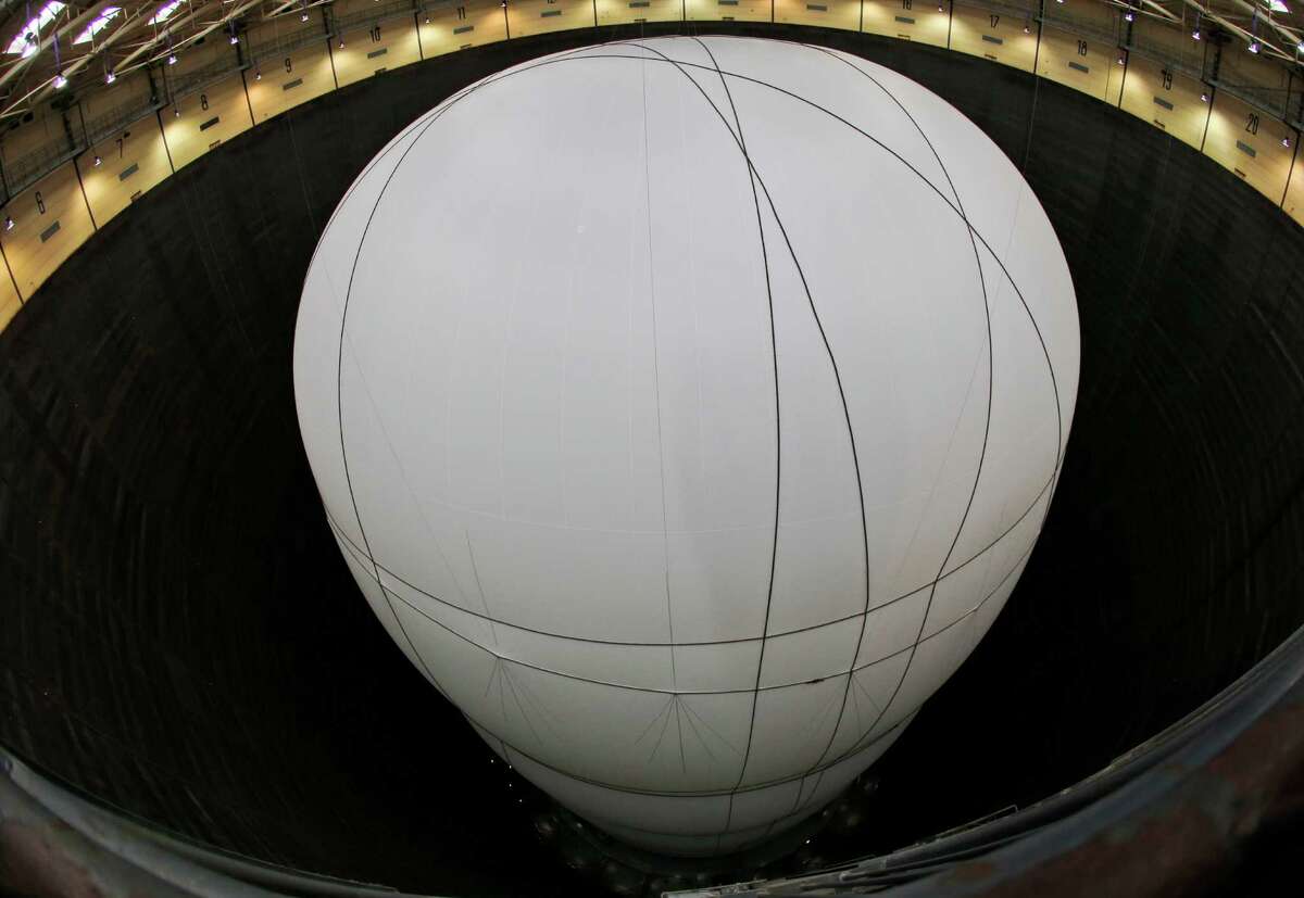 The outside installation is pictured during the unveiling of the installation 'Big Air Package' by artist Christo at the industrial memorial Gasometer in Oberhausen, Germany, Friday, March 15, 2013. (AP Photo/Frank Augstein)