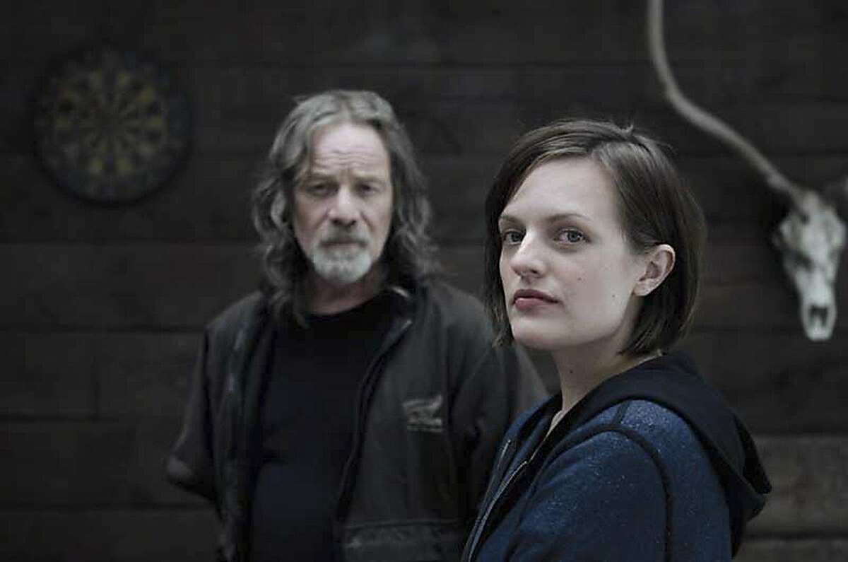 An undated handout photo of Peter Mullan, left, and Elisabeth Moss in Jan Campion's mini-series "Top of the Lake." Campion's show, set to premiere on March 18 on the Sundance Channel, was the first TV show to be screened at the 2013 Sundance Film Festival. (Parisa Taghizadeh/See-Saw Films via The New York Times) -- NO SALES; FOR EDITORIAL USE ONLY WITH STORY SLUGGED TV-LAKE-SUNDANCE-ADV03. ALL OTHER USE PROHIBITED. -- PHOTO MOVED IN ADVANCE AND NOT FOR USE - ONLINE OR IN PRINT - BEFORE MARCH 03, 2013.